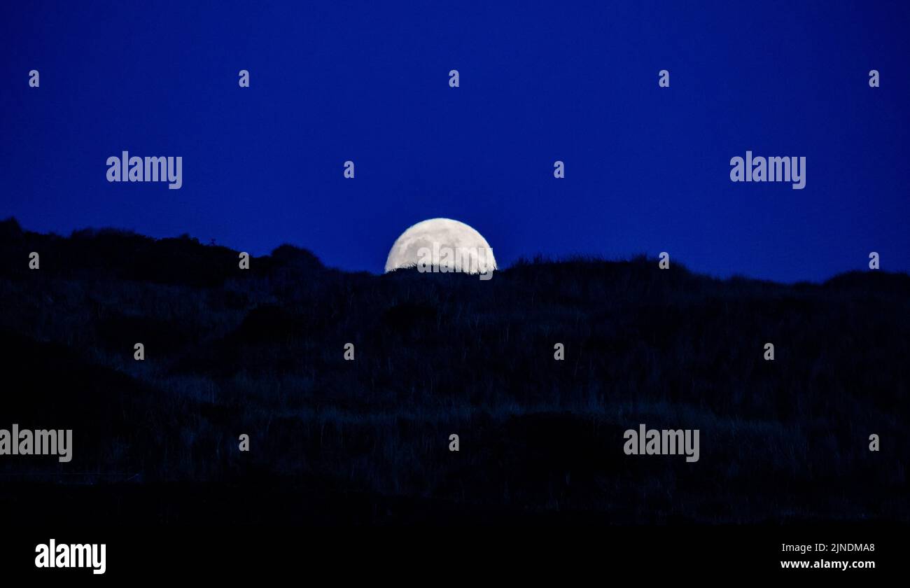 Moonrise in Godrevy, Cornwall,UK Stock Photo