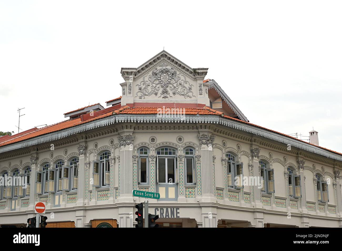 Corner terrace shophouses Joo Chiat Road Singapore, with distinctive Straits Chinese & rococo architecture, QiLin or Chinese unicorns & floral designs Stock Photo
