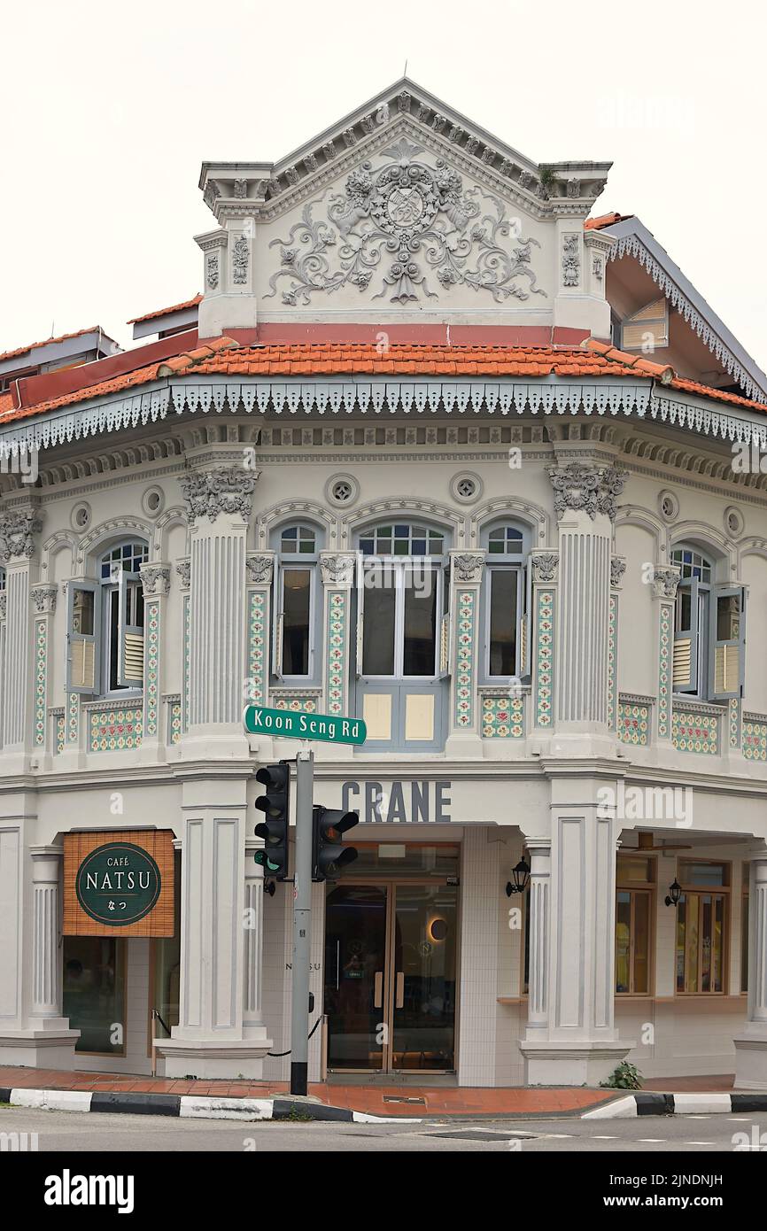 Conserved Peranakan shophouse dating from 1928 with plasterboard featuring QiLin or Chinese unicorns & floral designs along Joo Chiat Road, Singapore Stock Photo