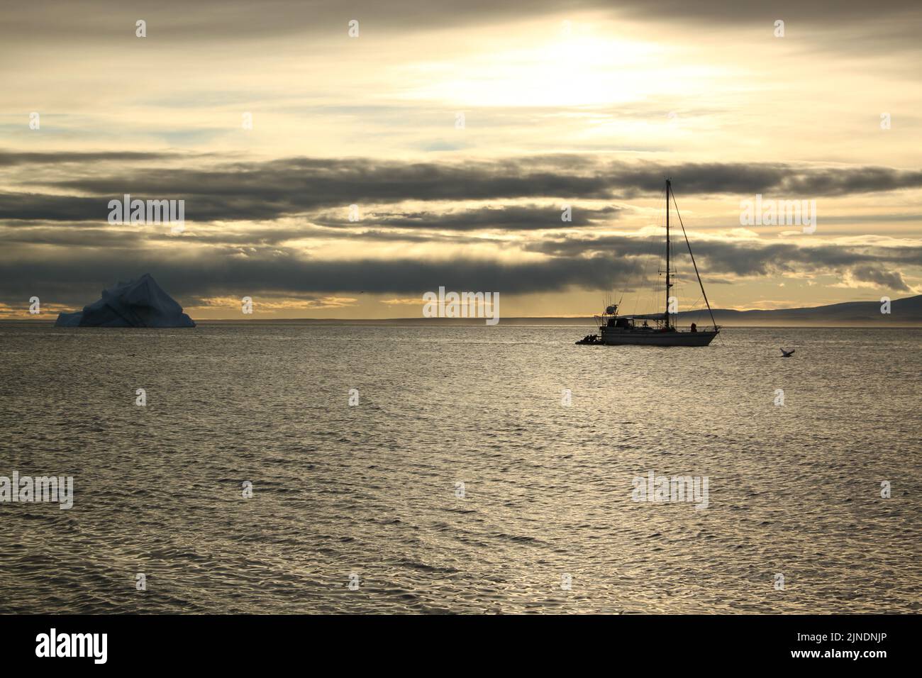 A sailboat anchored near Pond Inlet, Nunavut waiting for weather to
