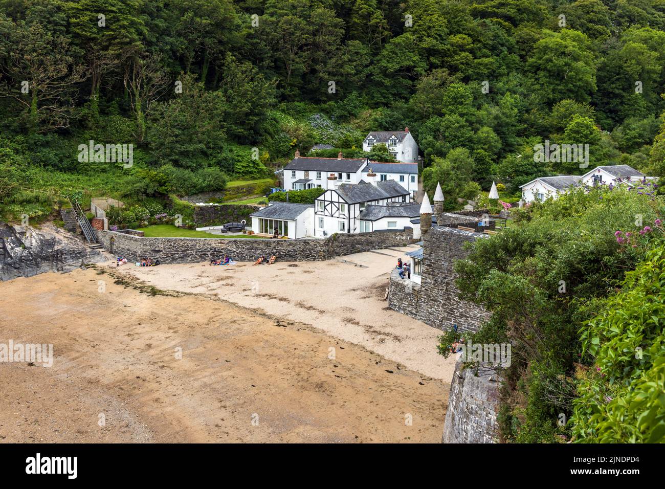 Looking down towards Readymoney Cove and its sandy beach to the south of the harbour town of Fowey, Cornwall. Stock Photo