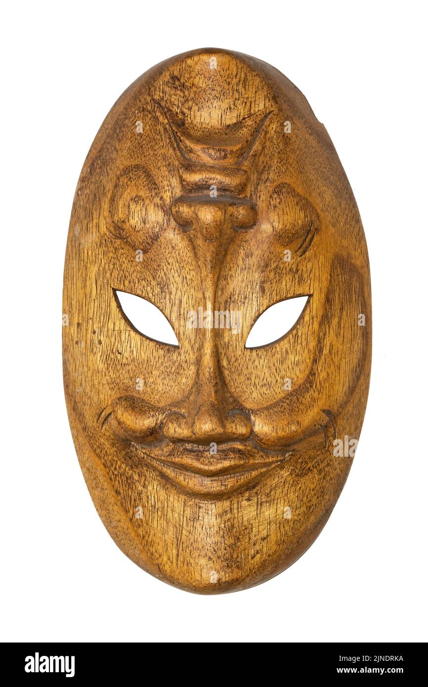 Wooden African mask isolated on white background. Travel souvenir. Stock Photo