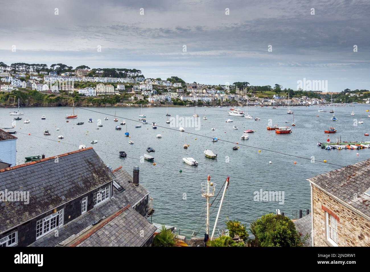 Fowey captured from the Polruan side of the River Fowey Estuary in Cornwall. Stock Photo