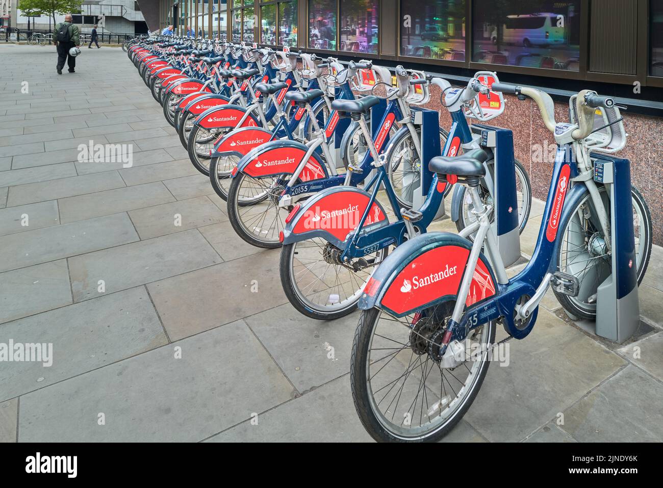 Electric hire bicycles on their charger stands, London, England Stock