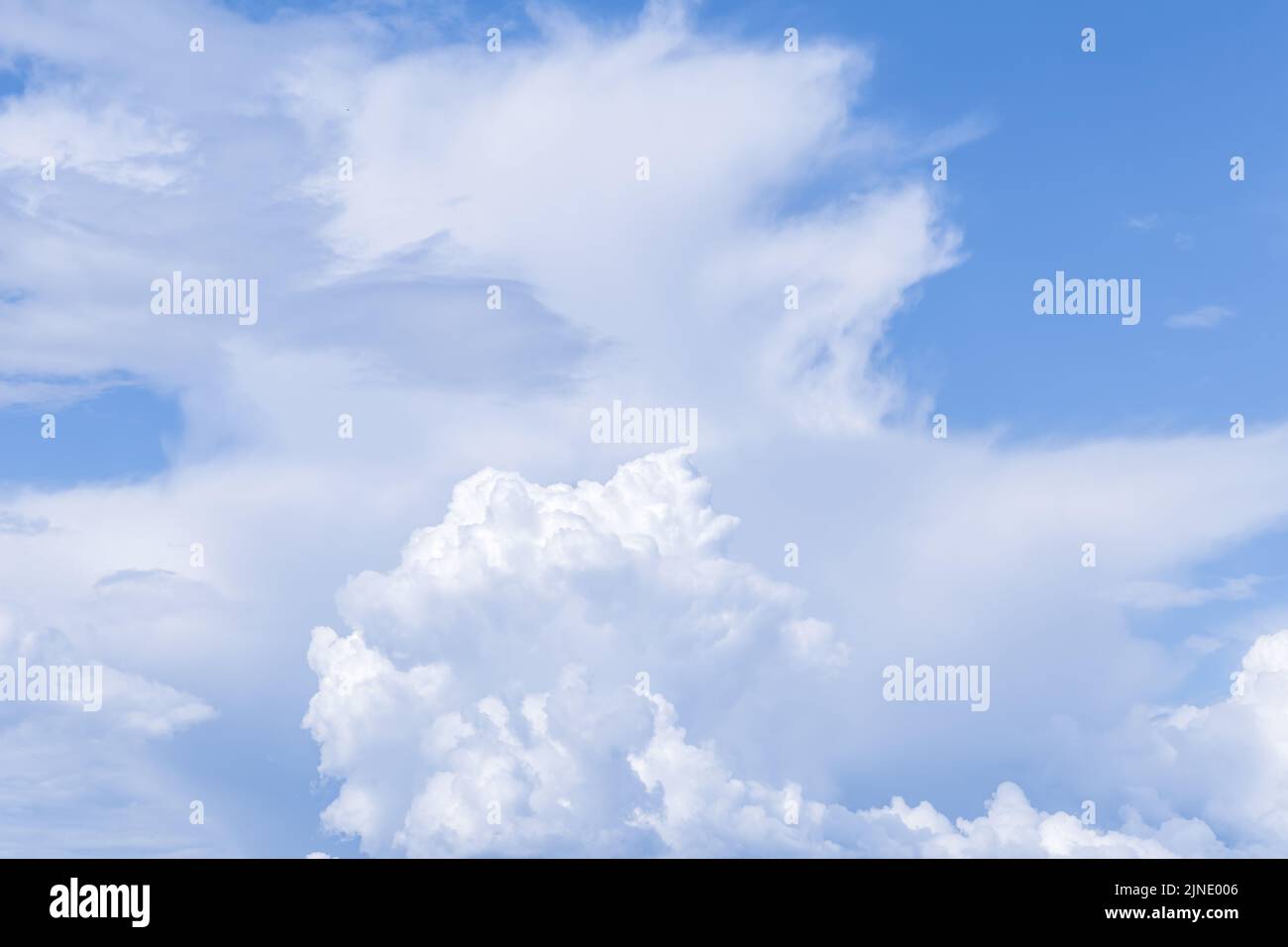 Clear blue sky and beautiful white clouds. Summer season. Cumulus cloud, nature background. Cloudscape. Abstract wallpaper, heaven pattern Stock Photo