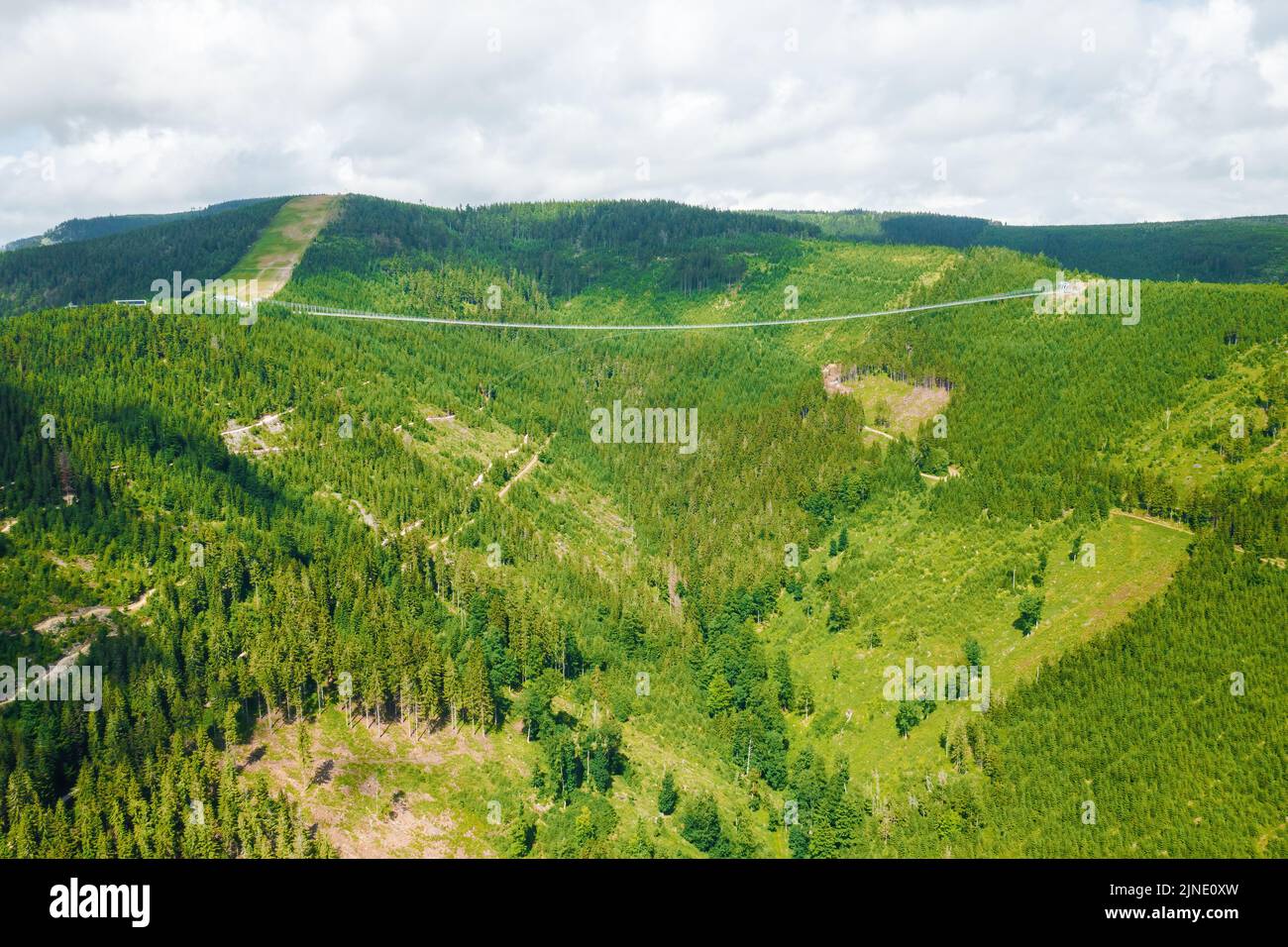 Aerial view of suspension Sky Bridge 721 and observation tower in mountains, Dolni Morava, Czech Republic. Stock Photo