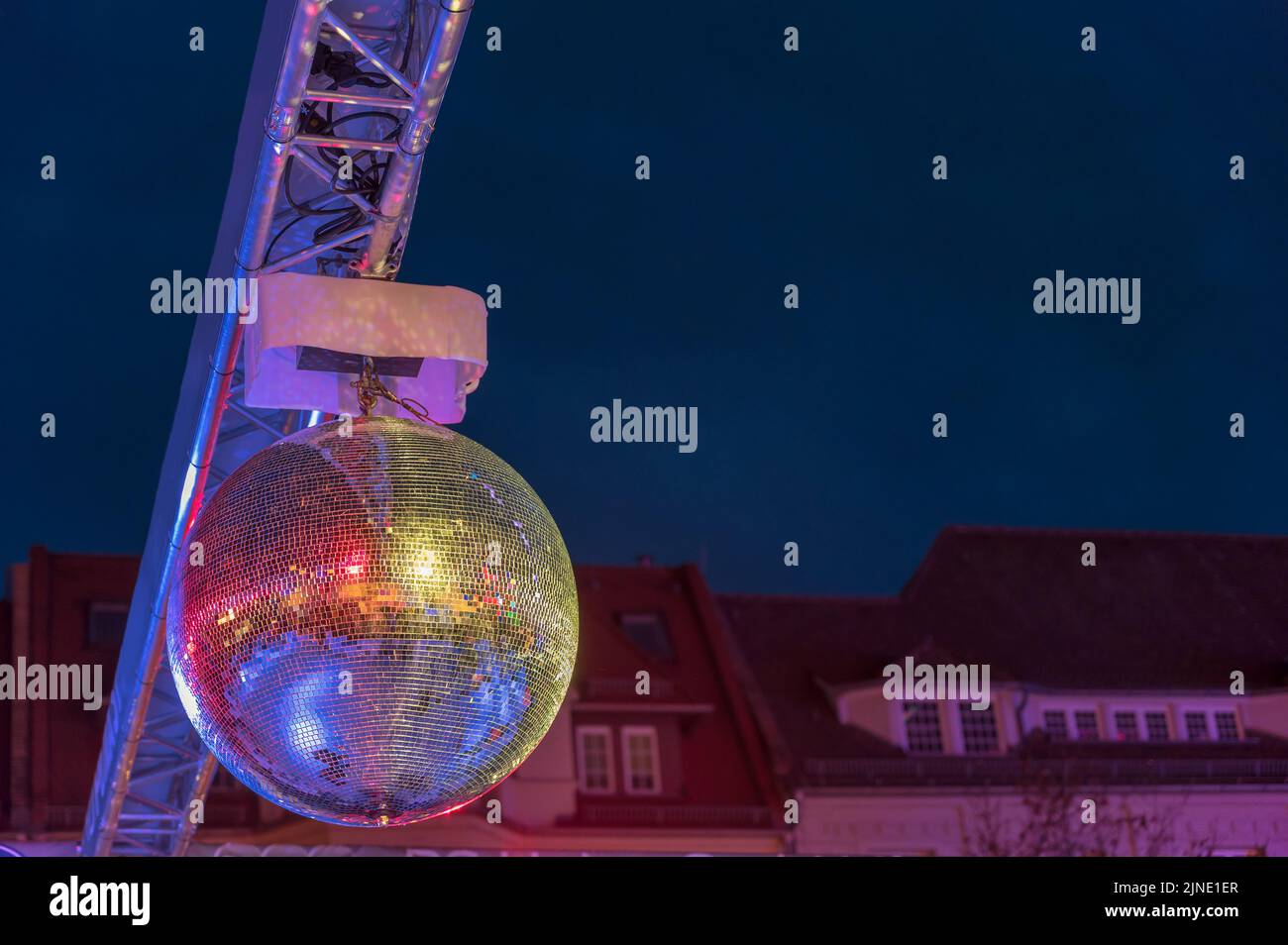 Disco ball against night sky with copy space Stock Photo