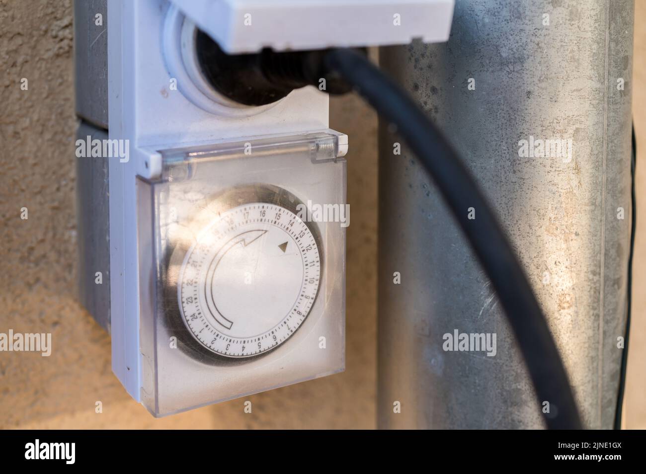 Socket with timer and power plug Stock Photo