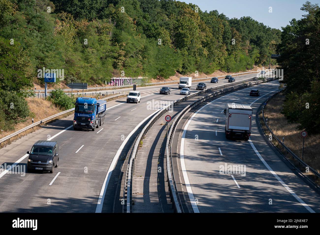 Berlin, Germany. 11th Aug, 2022. Cars and trucks are driving again on the Avus highway outside Berlin. The highway was closed until yesterday evening due to the fire at the Berlin police blast site in Grunewald. Credit: Fabian Sommer/dpa/Alamy Live News Stock Photo