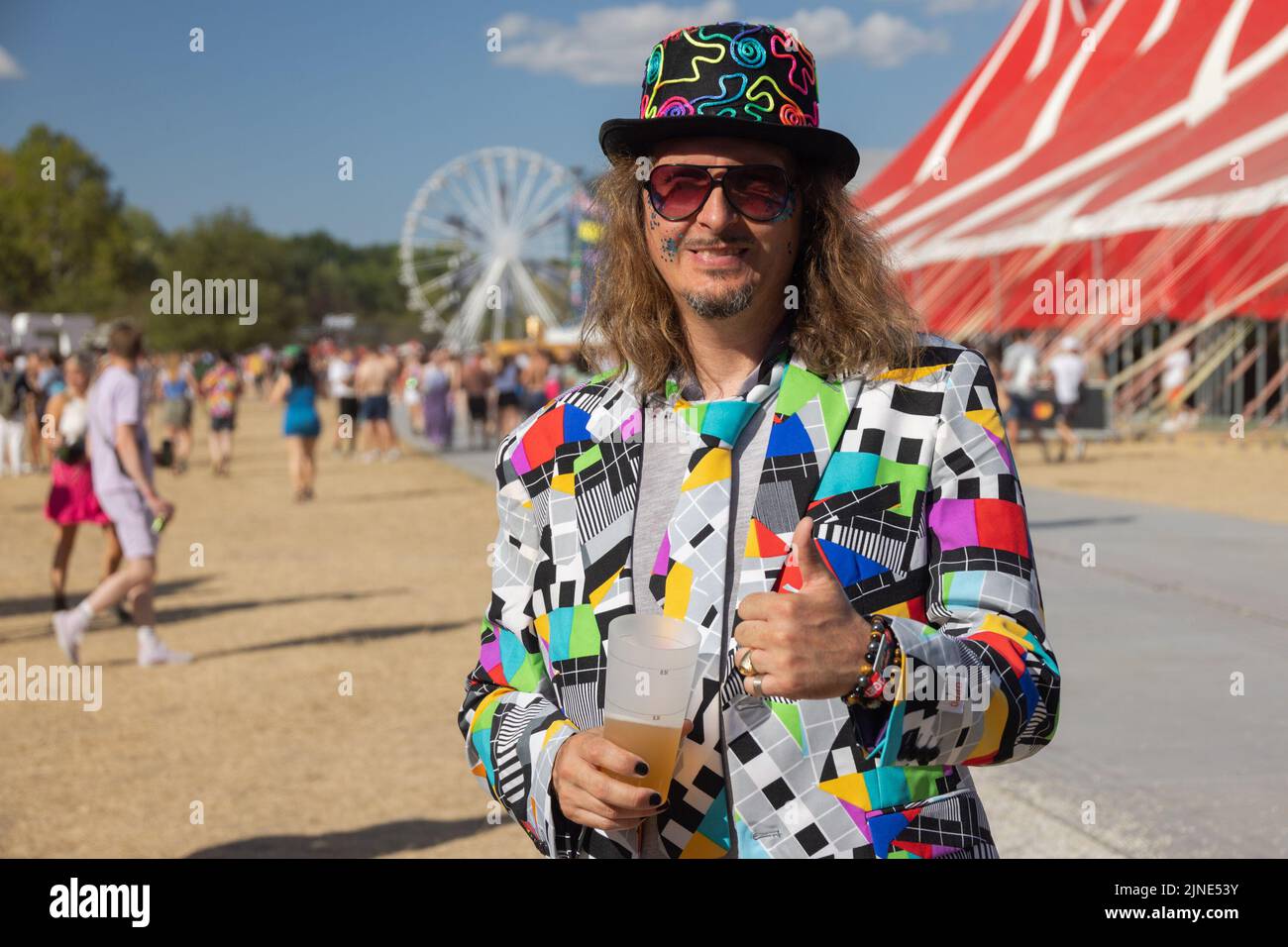 Budapest. 10th Aug, 2022. A festival-goer poses for photos at Sziget Festival in Budapest, Hungary on Aug. 10, 2022. Credit: Attila Volgyi/Xinhua/Alamy Live News Stock Photo