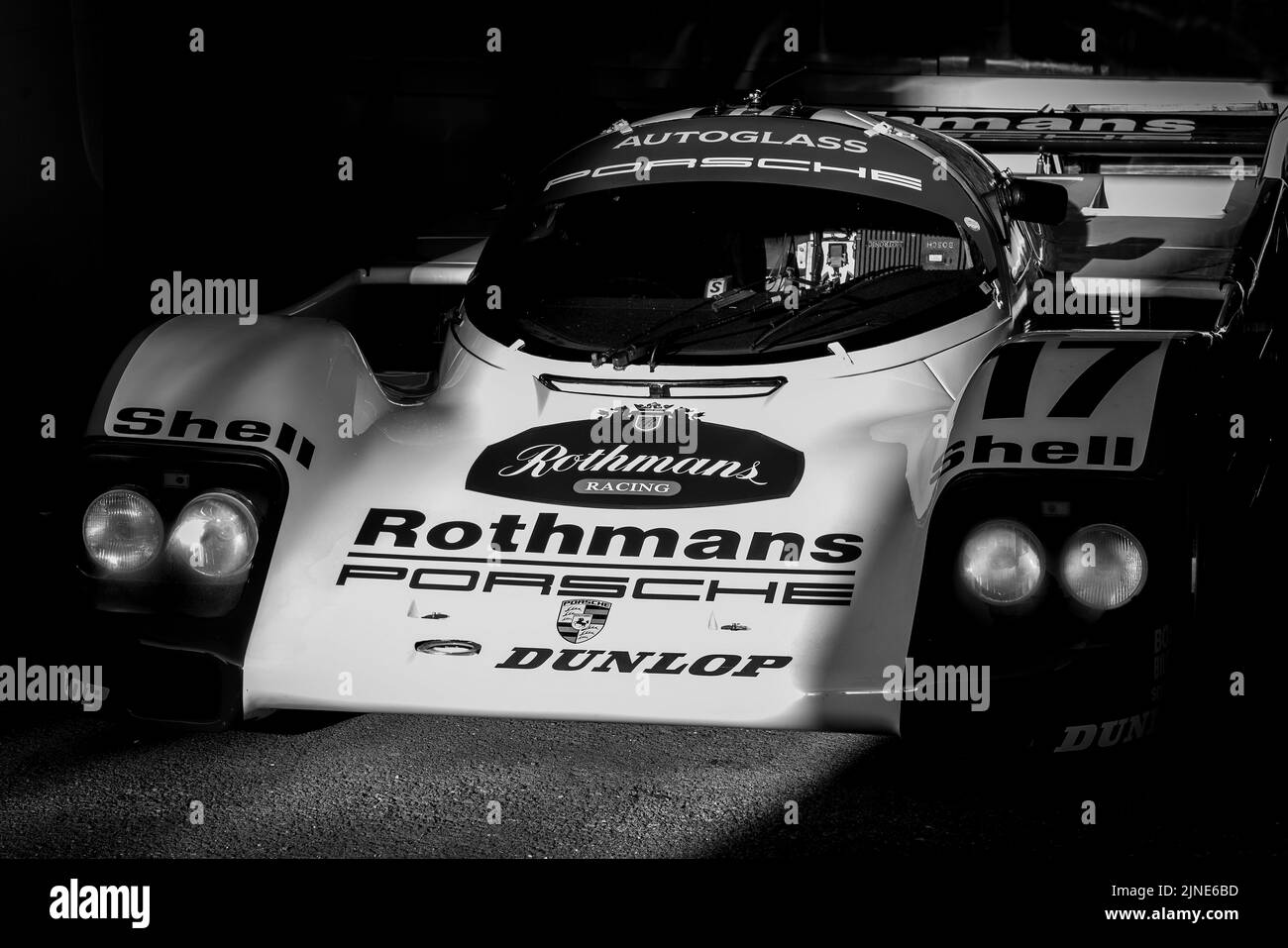 1987 Porsche 962C sunlit in the paddock at the Goodwood 79th Members Meeting, Sussex, UK. Stock Photo