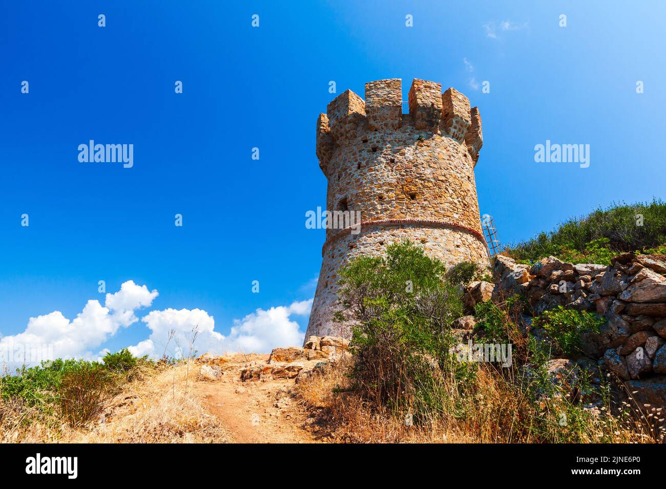 Campanella tower on a sunny day. One of the Genoese towers in Corsica, a series of coastal forts constructed by the Republic of Genoa between 1530 and Stock Photo