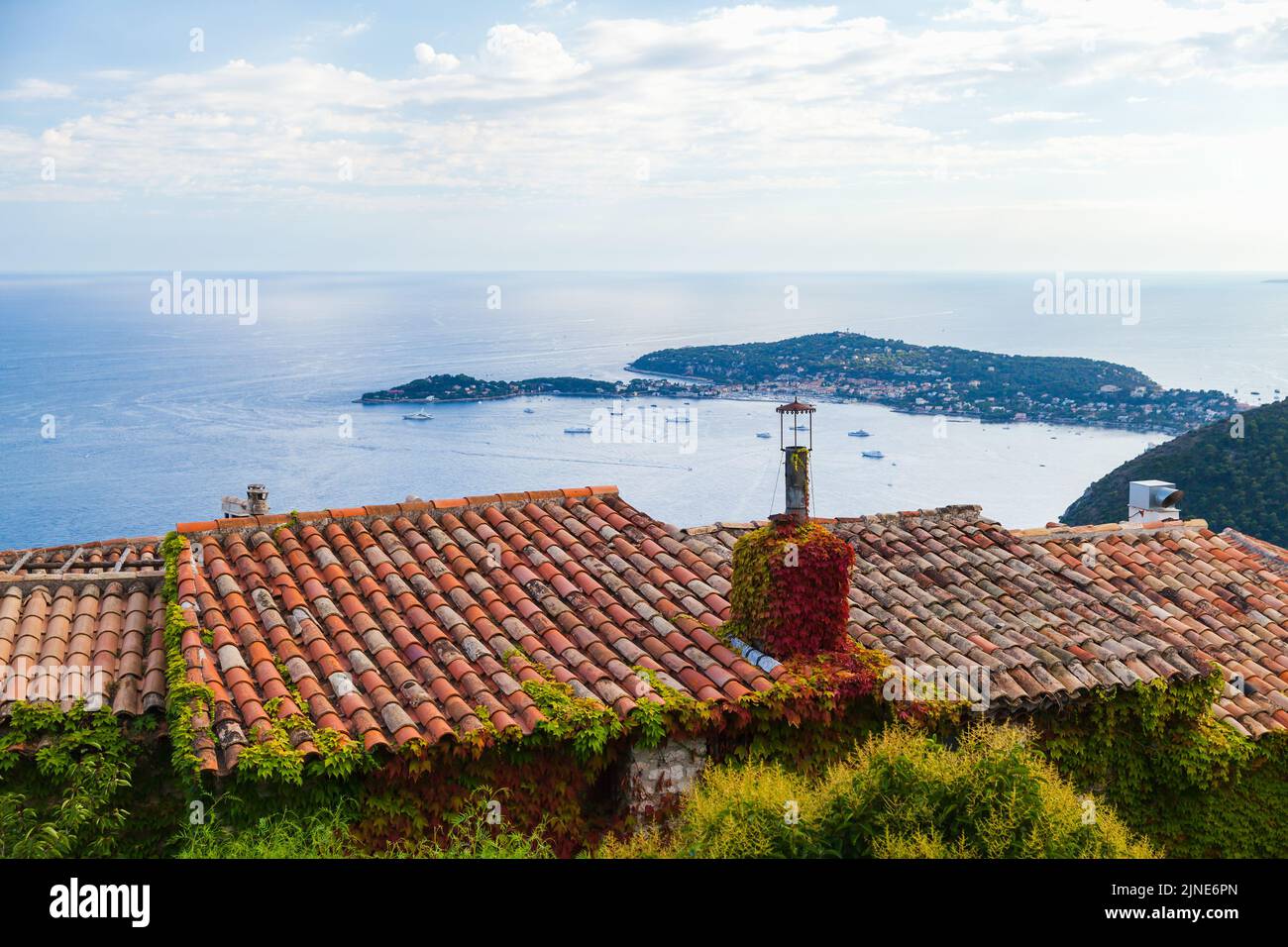 Eze, Alpes-Maritimes, France. Coastal landscape with old red tile roofs Stock Photo