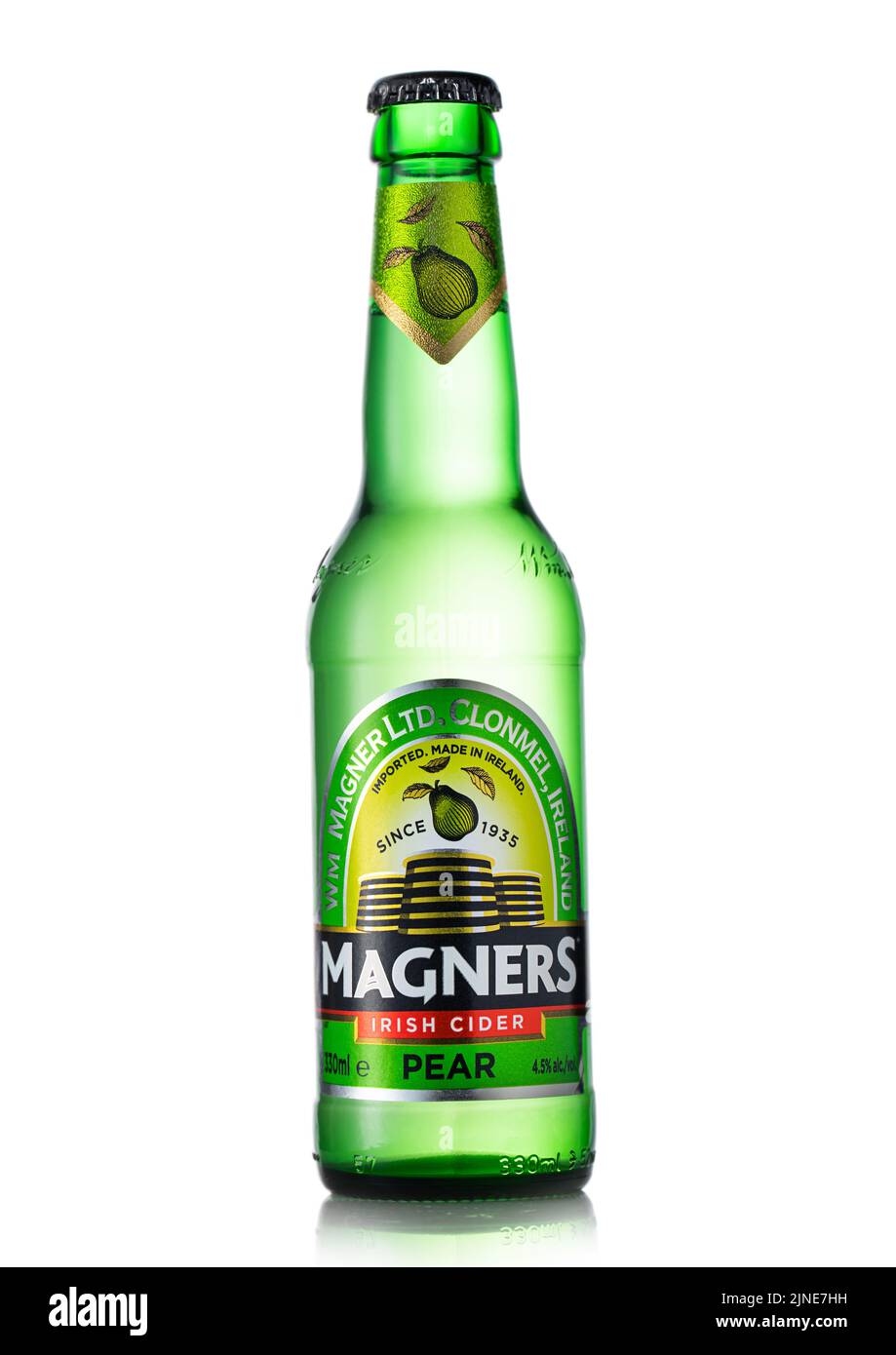 LONDON, UK JUNE 30, 2022 Pear cider by Magners in glass bottle on white. Premium irish cider