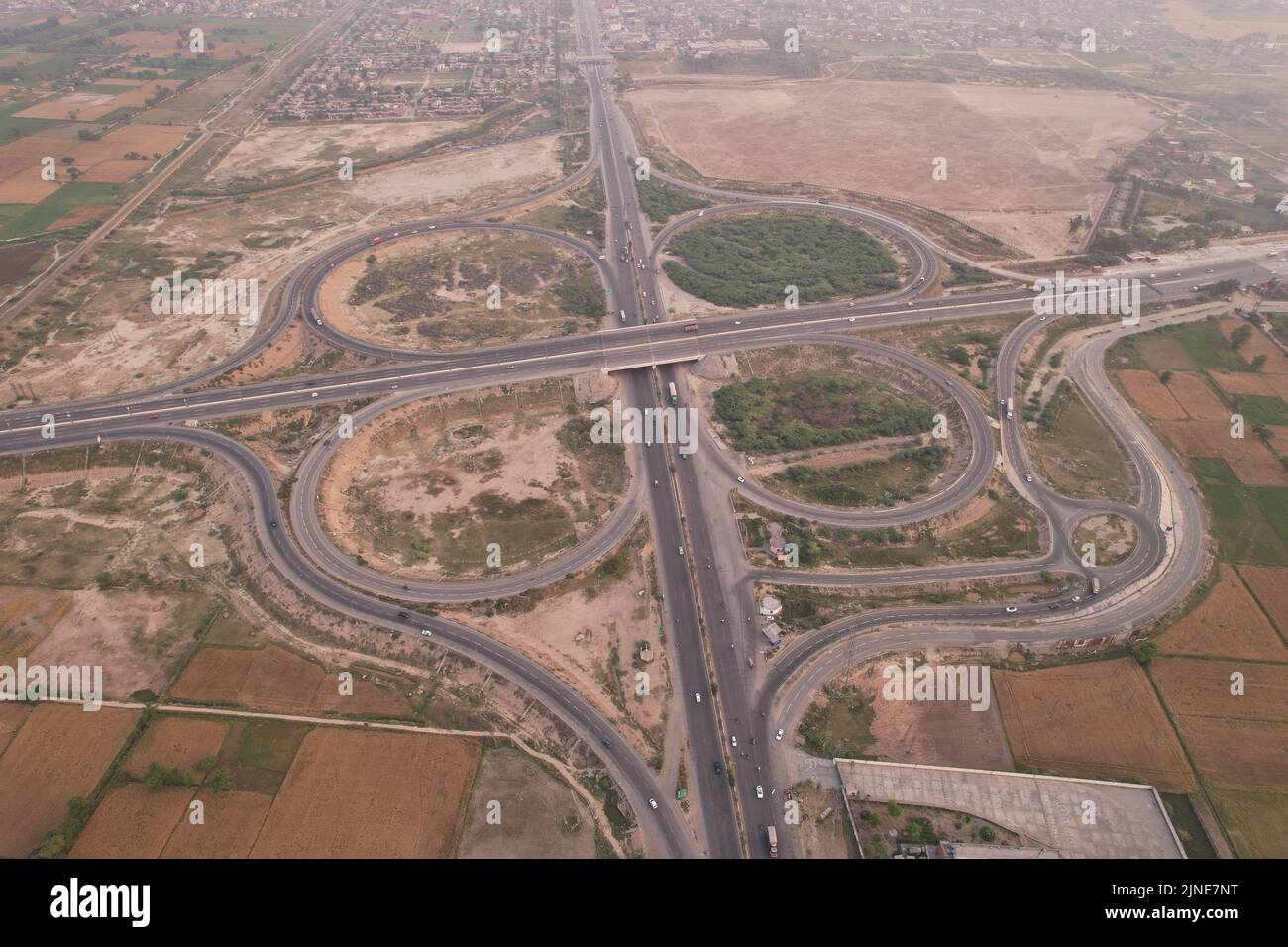 High Angle Footage and Aerial View of Pakistani Motorways M2 at Kala Shah Kaku Interchange to GT
