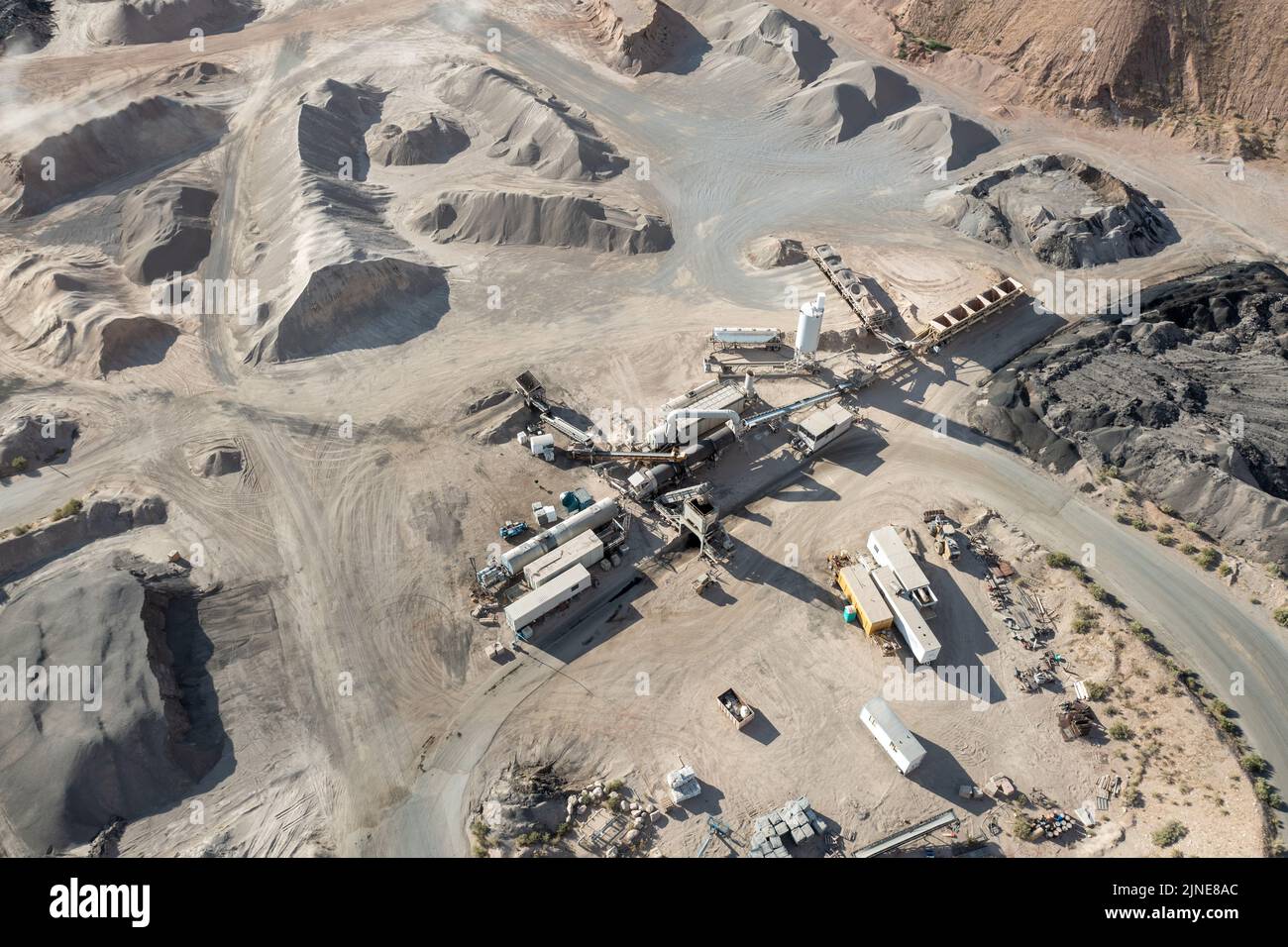 Aerial view of a mobile asphalt drummix plant in a gravel pit in