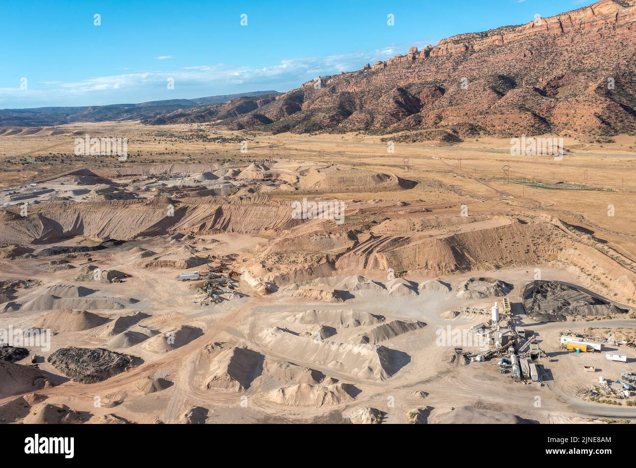 Aerial view of a mobile asphalt drum-mix plant in a gravel pit in Spanish Valley, near Moab, Utah. Stock Photo