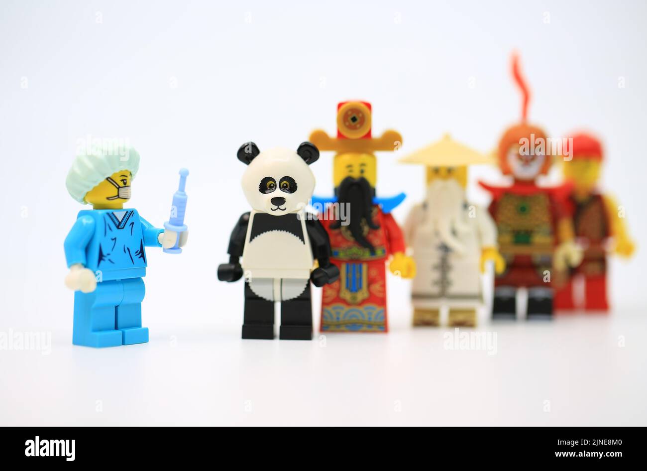 people wearing the chinese and panda costume and waiting the vaccination and quarantine Stock Photo