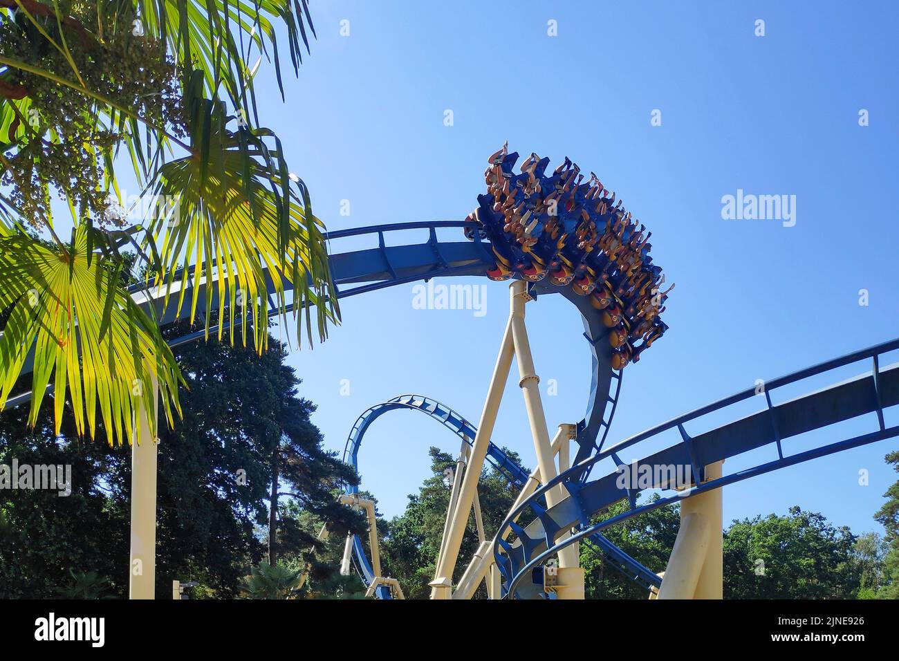 Plailly, France - August 10 2022: OzIris is a steel inverted roller coaster located in Parc Astérix, a theme park in France based on the comic book se Stock Photo