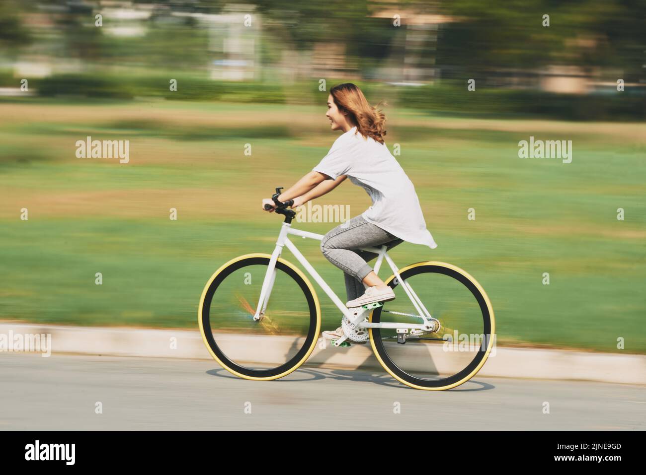 Vietnamese female riding bicycle hi-res stock photography and images ...