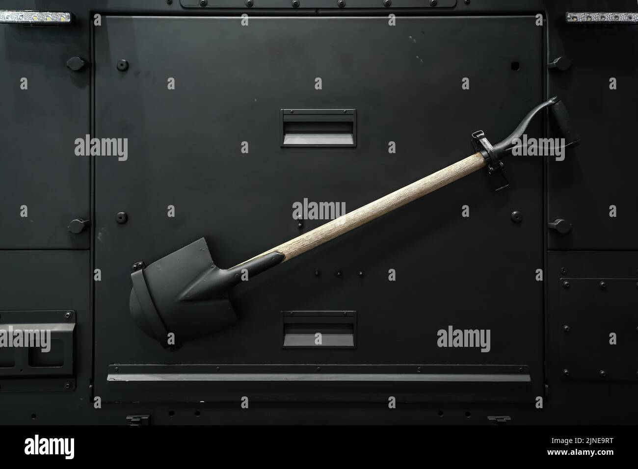 Shovel mounted on back of armoured 4wd vehicle, closeup detail Stock Photo Alamy