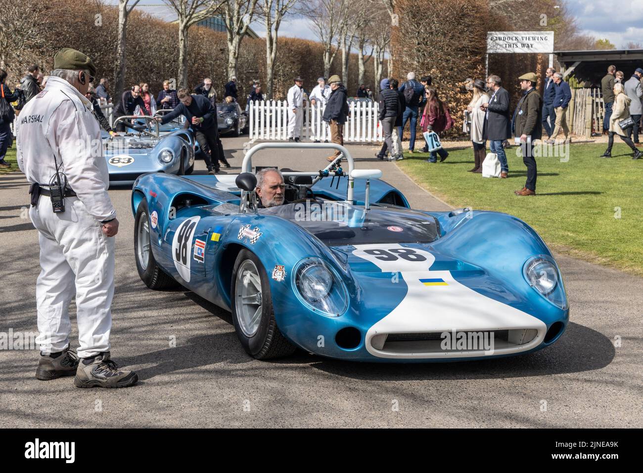 1965 Lola-Chevrolet T70 Spyder is rolled through the paddock prior to the Surtees Trophy race at the Goodwood 79th Members Meeting, Sussex, UK. Stock Photo