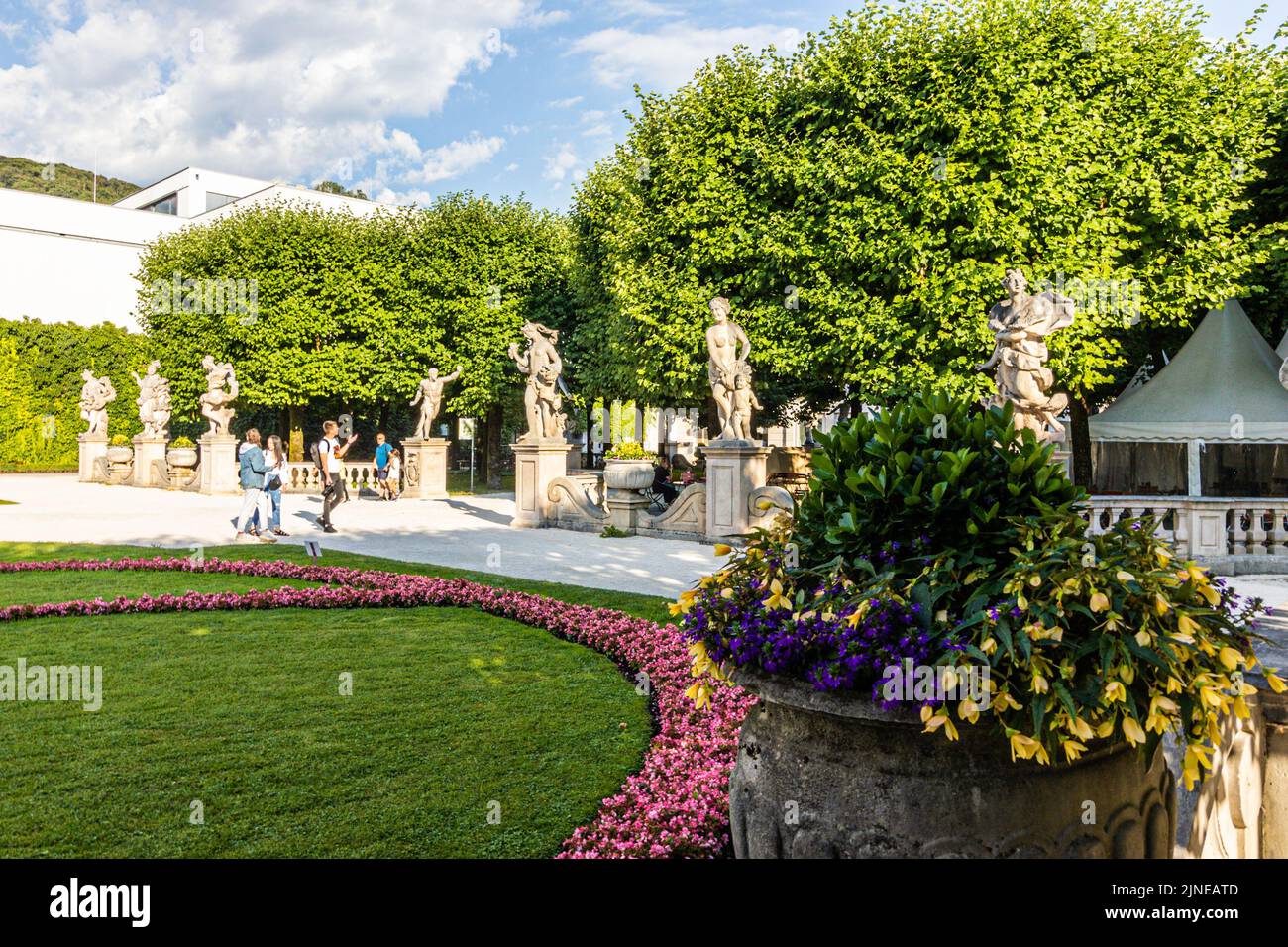 people enjoying bwalking around the famous Mirabelle gardens, Salzburg, Austria Stock Photo