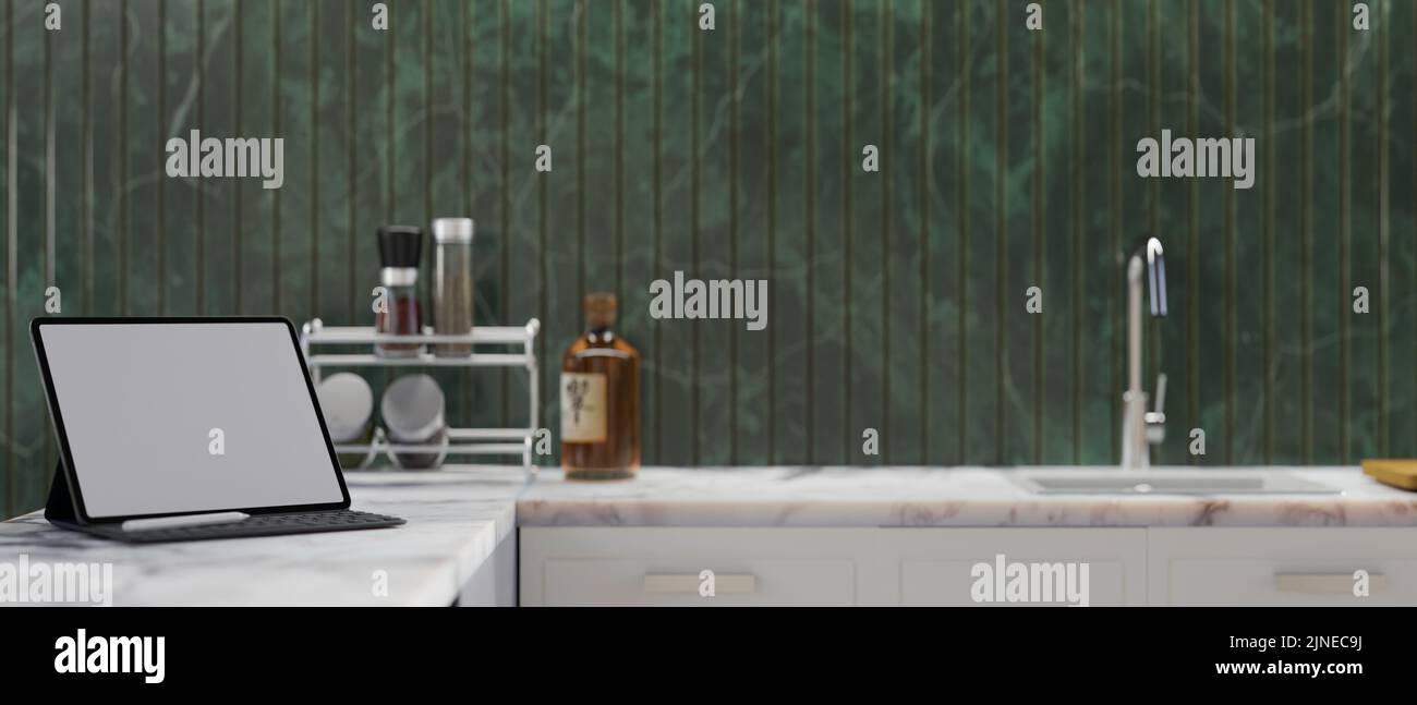 Stylish white marble kitchen tabletop with portable tablet white screen ...