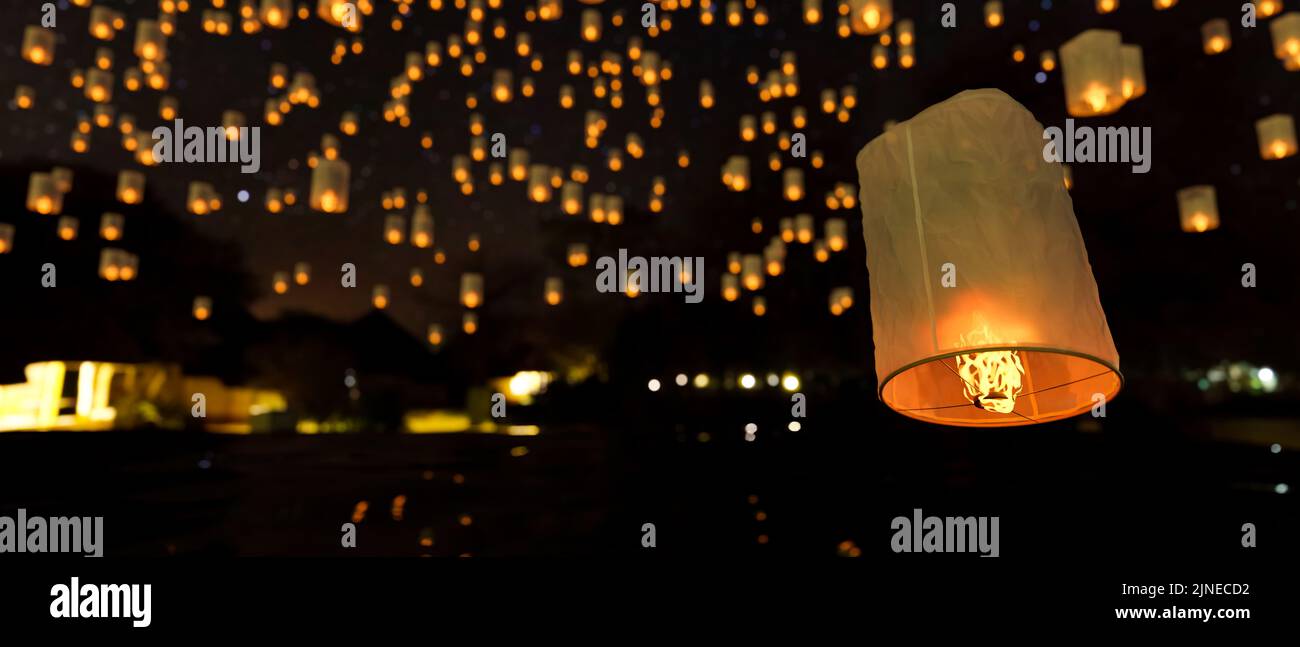 A group of beautiful sky lantern in the background. Loy Krathong Festival, Yi Peng Festival in