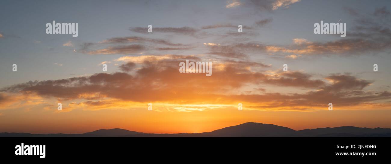Panorama of a dramatic evening sky Stock Photo