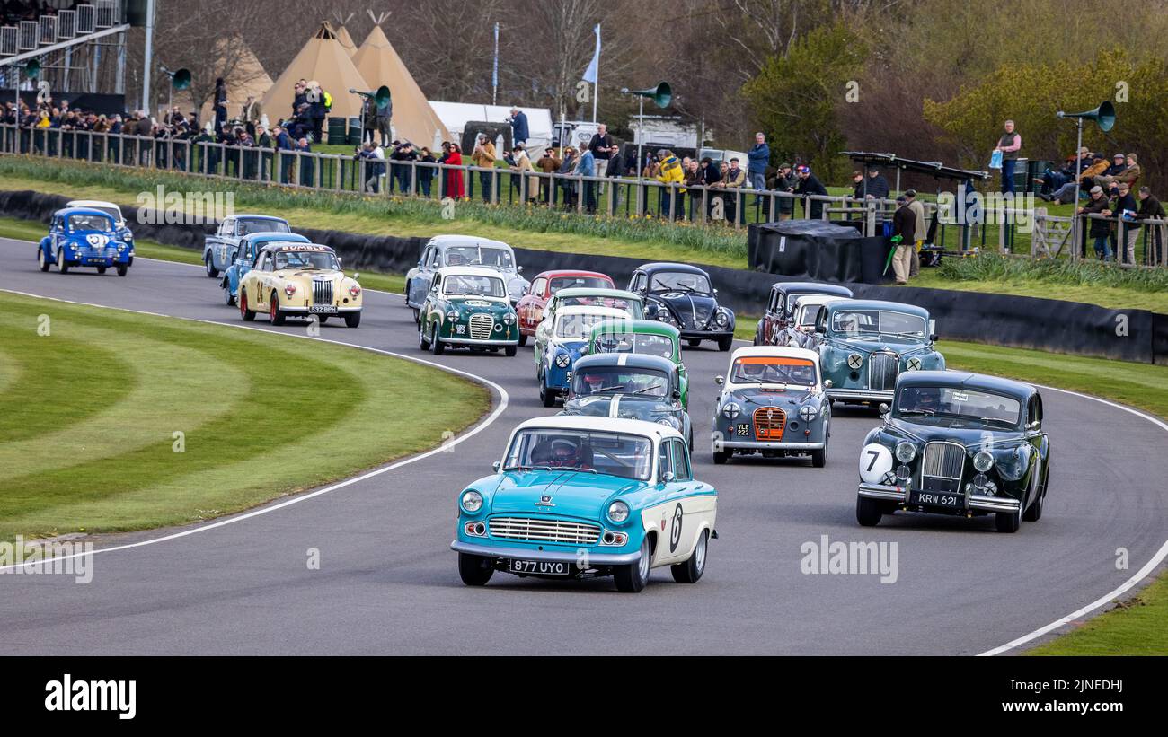 The Sopwith Cup race for saloon cars up to 1956 gets underway at Madgwick Corner at the Goodwood 79th Members Meeting, Sussex, UK. Stock Photo