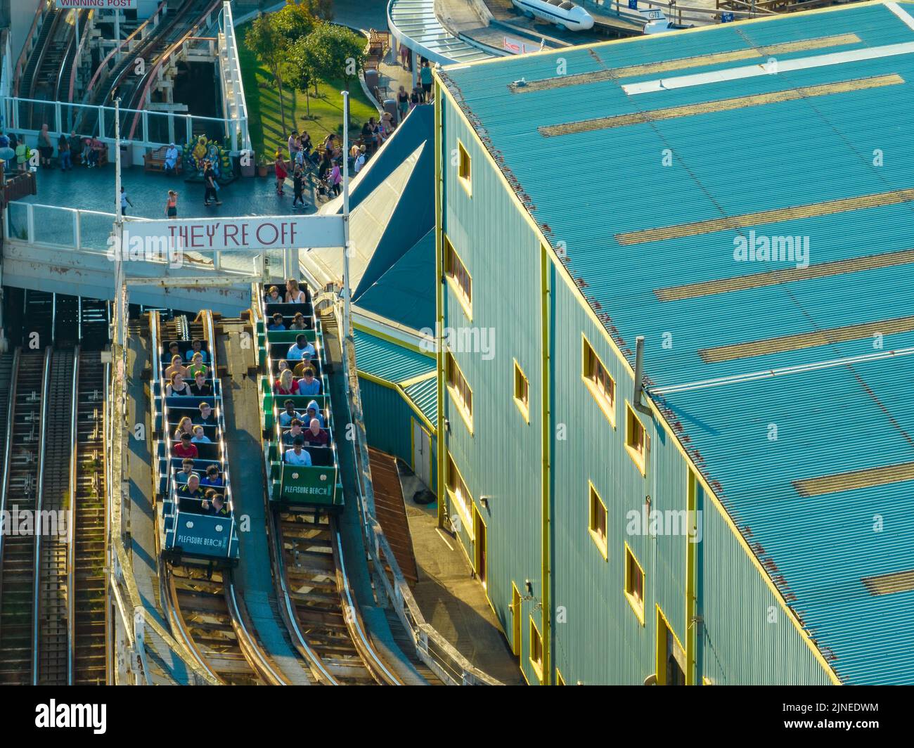 Blackpool Pleasure Beach, BPB, Grand National, Big One, Icon, Pier , Valhalla, Rides in Action Aerial Drone , As seen from the Air, Birds Eye View Stock Photo