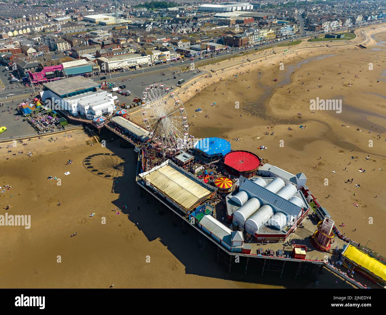 Blackpool Pleasure Beach, BPB, Grand National, Big One, Icon, Pier , Valhalla, Rides in Action Aerial Drone , As seen from the Air, Birds Eye View Stock Photo