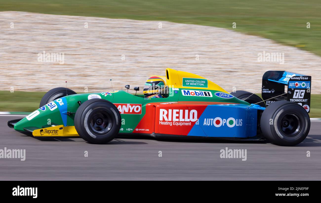 1990 Benetton-Ford B190  F1 racer demonstration run with driver John Reaks at the 79th Goodwood Members Meeting, Sussex, UK. Stock Photo