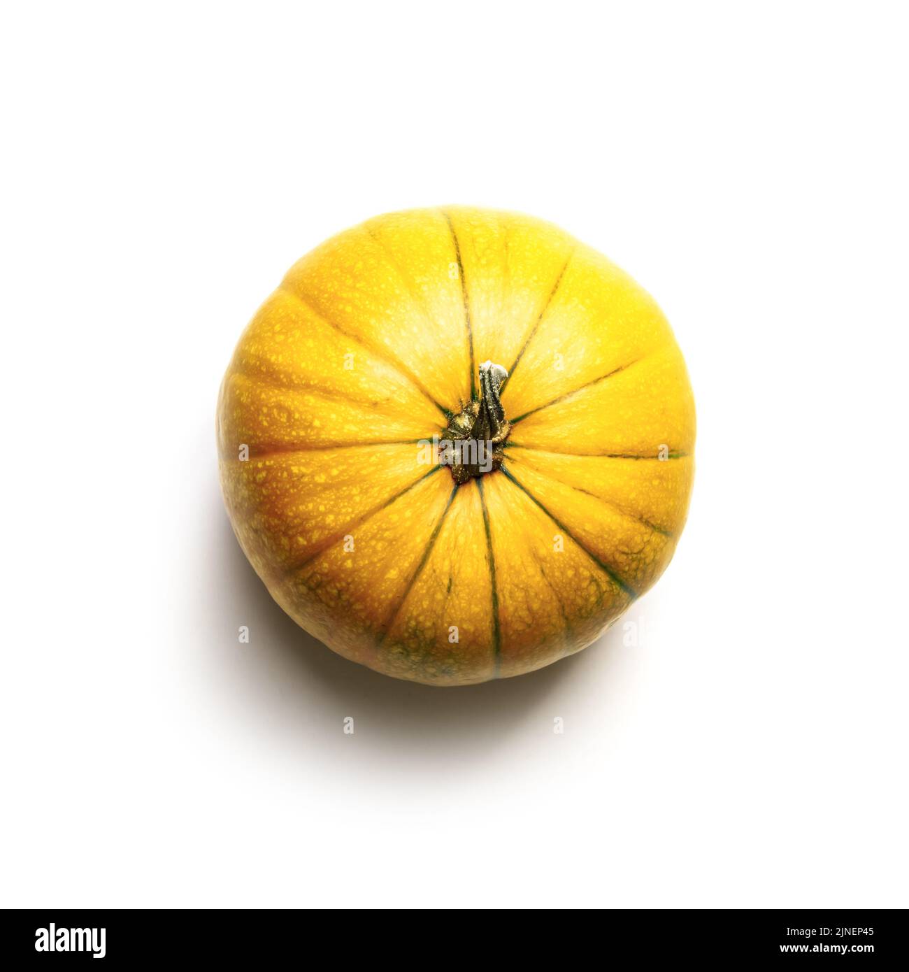 Yellow pumpkin isolated on white background. Food photography. Halloween concept. Top view. Part of set different kinds of pumpkins. Stock Photo