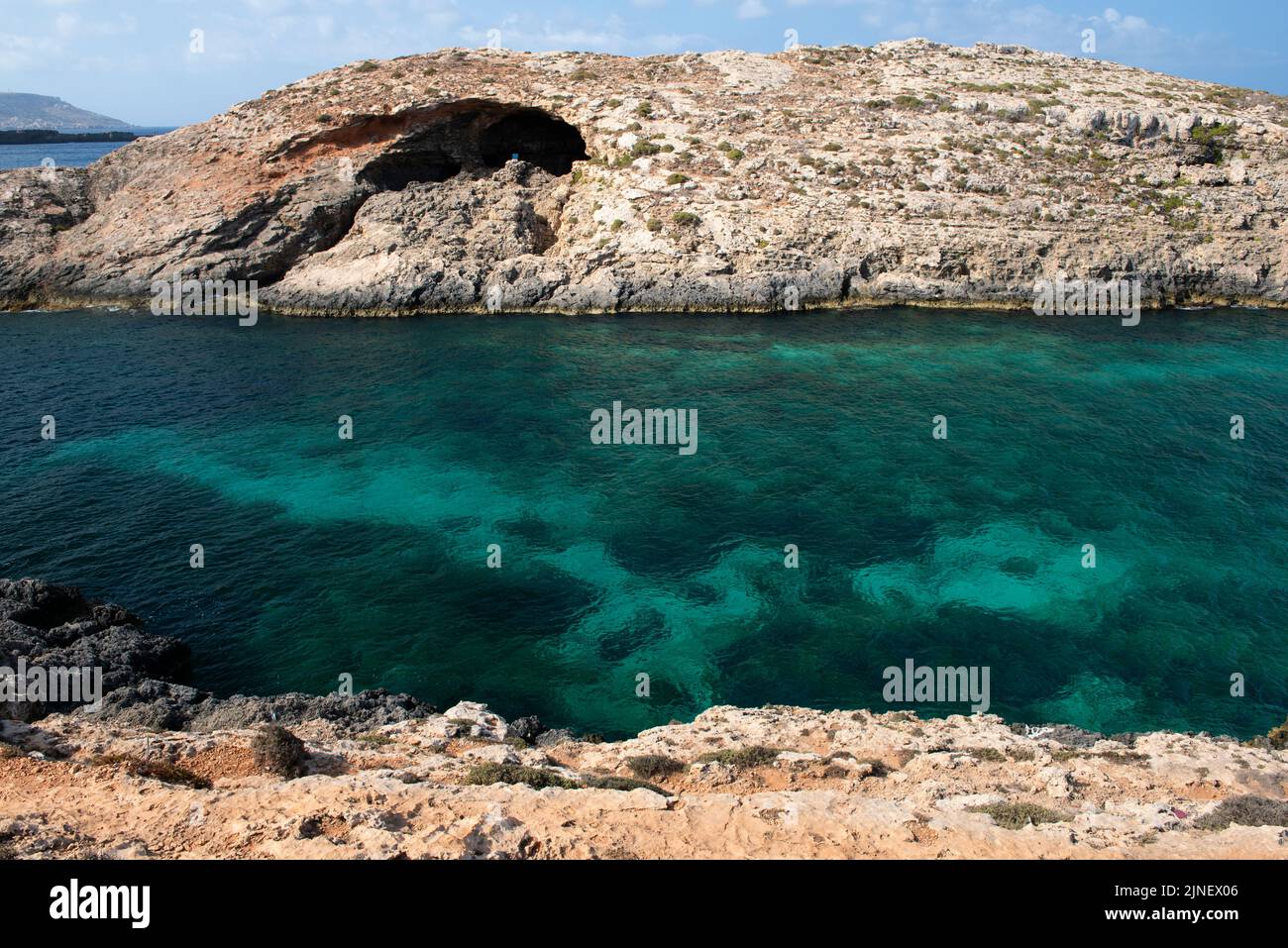 Beautiful scenic view of Comino island, Malta on nice sunny summer day. Turquise sea and rocky cost in Comino island, Malta Stock Photo