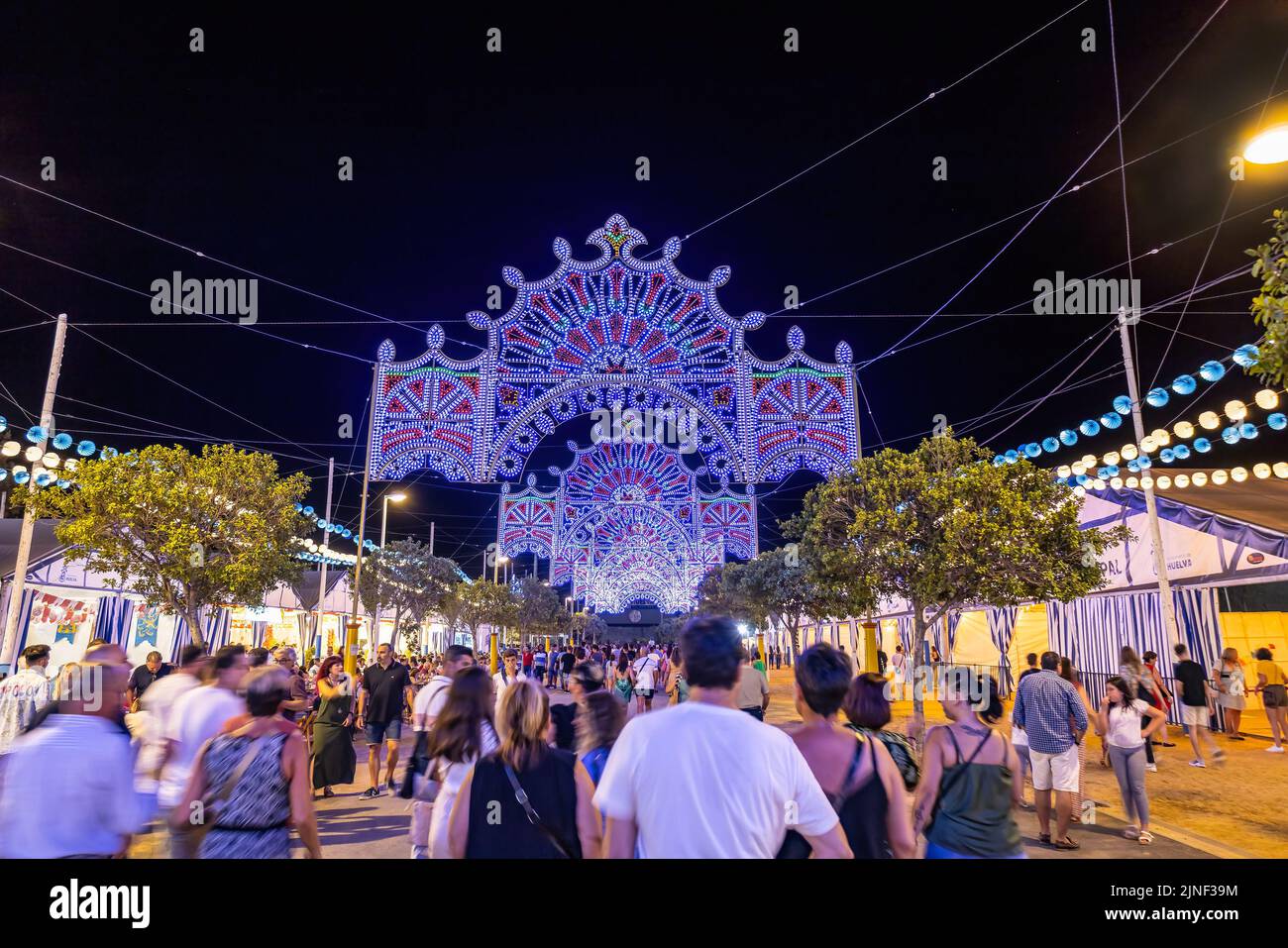 Huelva, Spain - August 1, 2022: Lights decoration  of The Columbian Festivals celebrations in the city of Huelva (Fiestas Colombinas de Huelva), to co Stock Photo