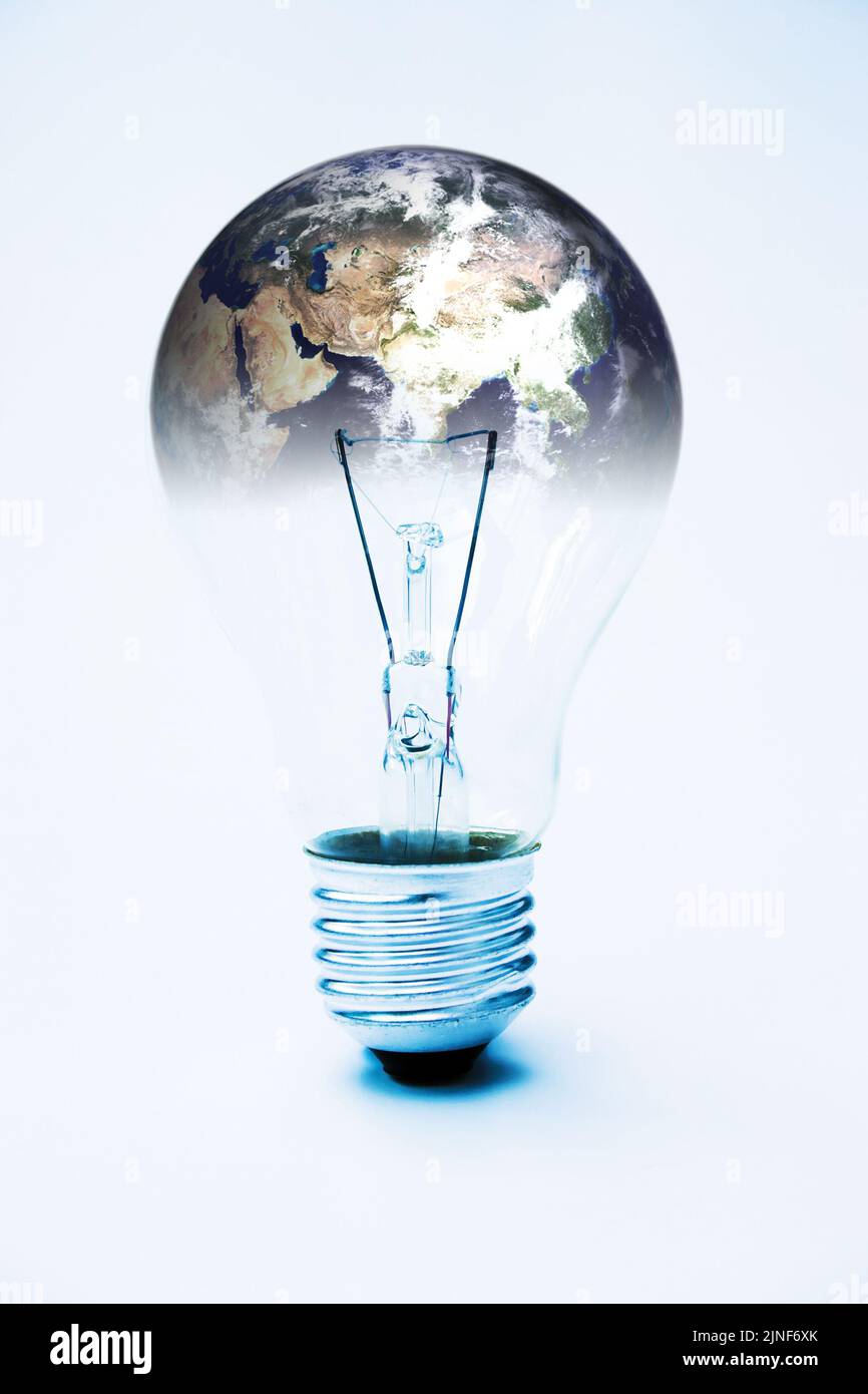 Light bulb & planet earth (courtesy of NASA) global power concept - image is supposed to be quite stark & contrasty Stock Photo