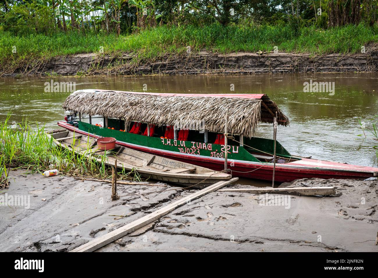 The U.S.S. Dani serves as school transportation boat for riberenos in the Ayacucho area of the Peruvian Amazon Stock Photo