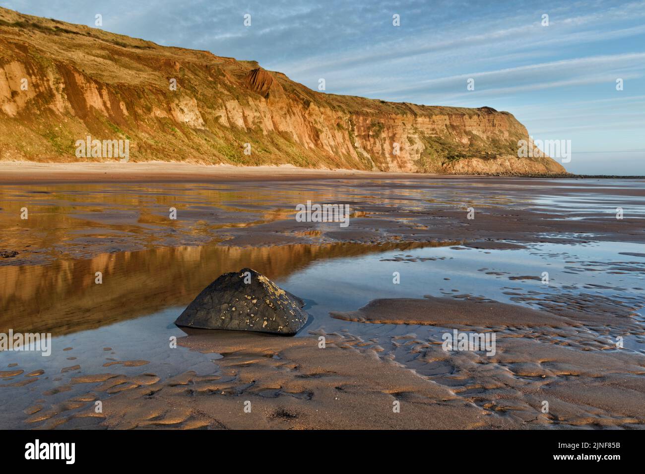 Early morning low tide view of the Cattersty Sands beach at Skinningrove looking towards Hunt Cliff Stock Photo