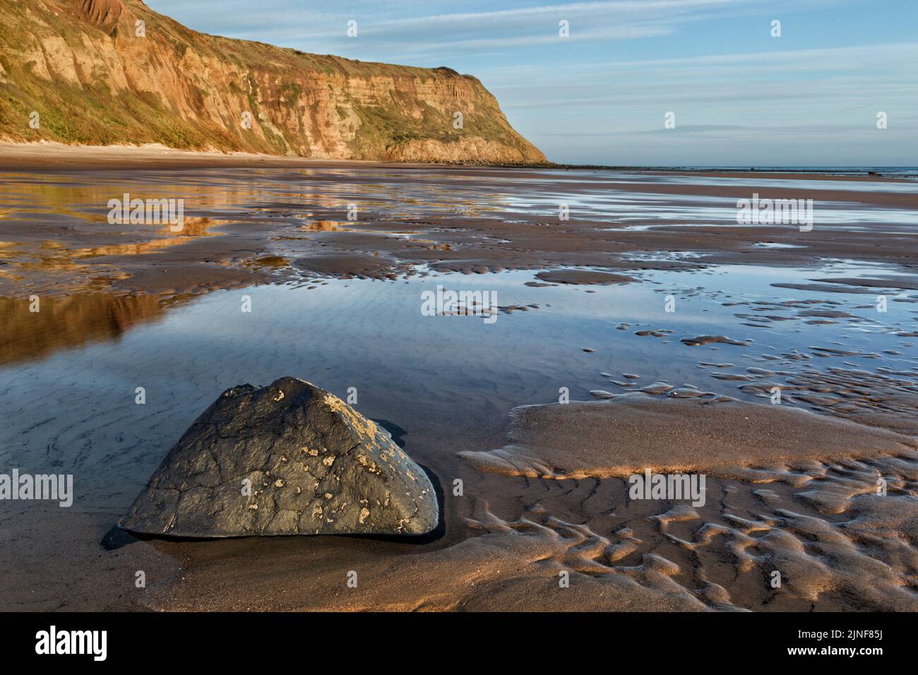 Early morning low tide view of the Cattersty Sands beach at Skinningrove looking towards Hunt Cliff Stock Photo