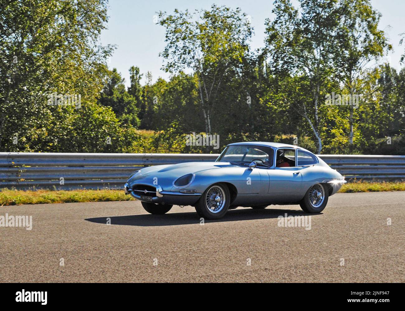 E Type Jaguar at speed Stock Photo