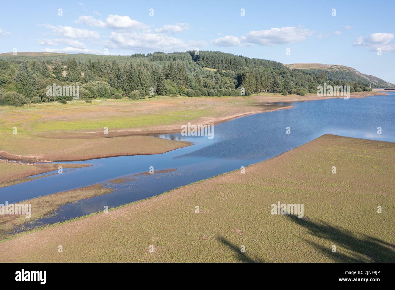 Aerial view of low water level in the Llwynonn Reservoir during the
