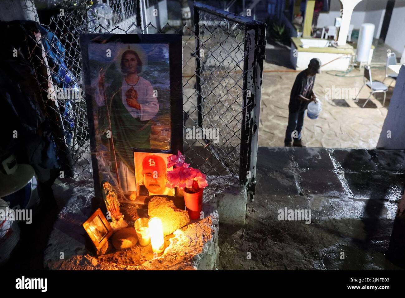 An altar made by relatives sits outside the facilities of a coal mine where a mine shaft collapsed leaving miners trapped, in Sabinas, Coahuila state, Mexico, August 11, 2022. REUTERS/Luis Cortes Stock Photo