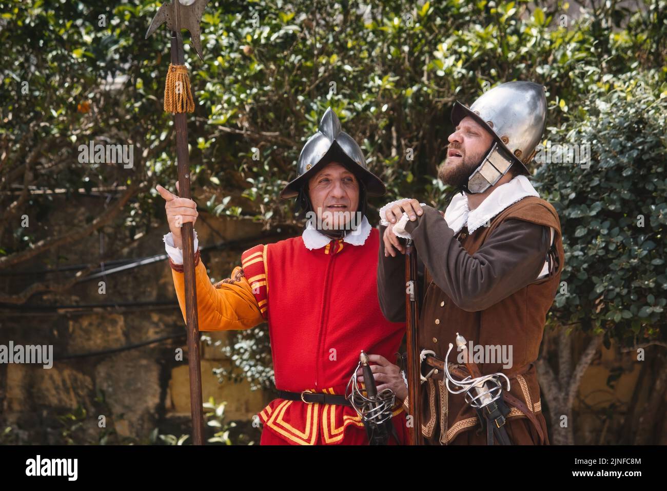Buskett , Malta - June 29 2022: Two men dressed up as medieval soldiers as part of an historic reenactment Stock Photo