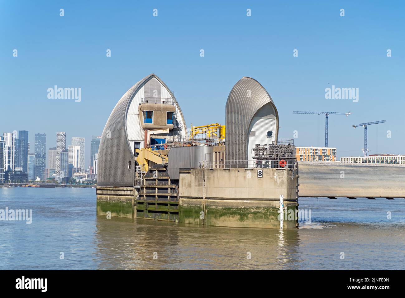 The Thames Barrier, London's flood defence system on a clear sunny day at high tide. Stock Photo