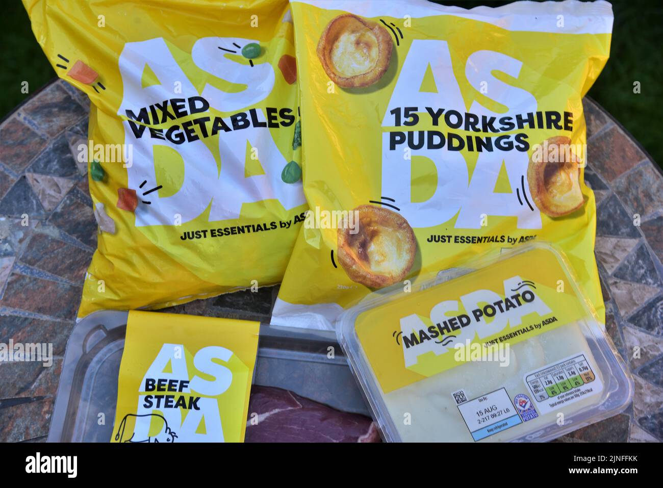 Just Essentials by Asda. As people have to tighten their purse strings due to inflation, fuel price, energy, and food prices. Budget food by Asda Stock Photo