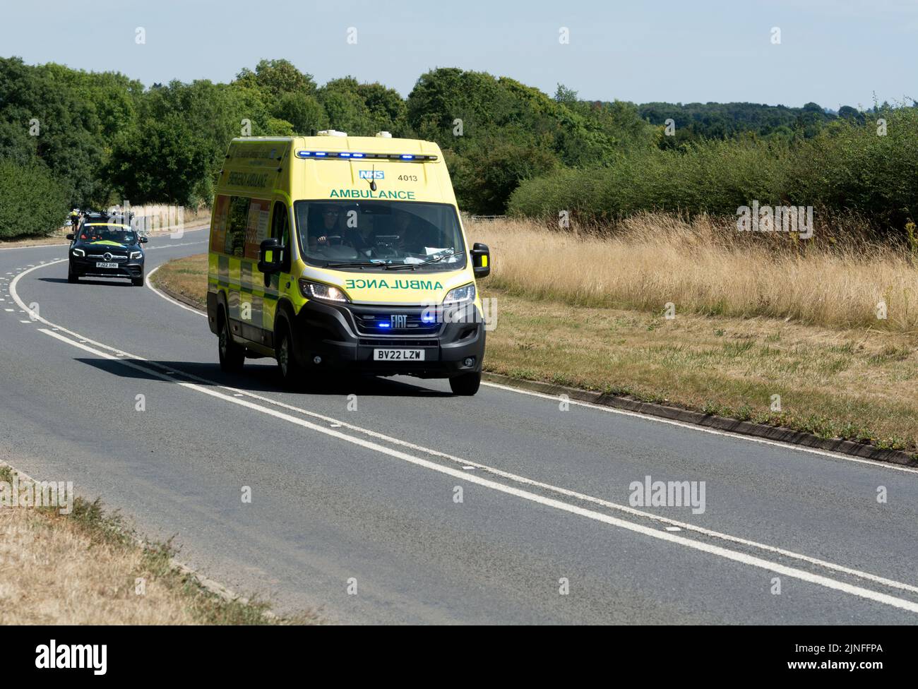 An ambulance for the 2022 Commonwealth Games cycling road race, Hampton Road, Warwick, Warwickshire, UK Stock Photo