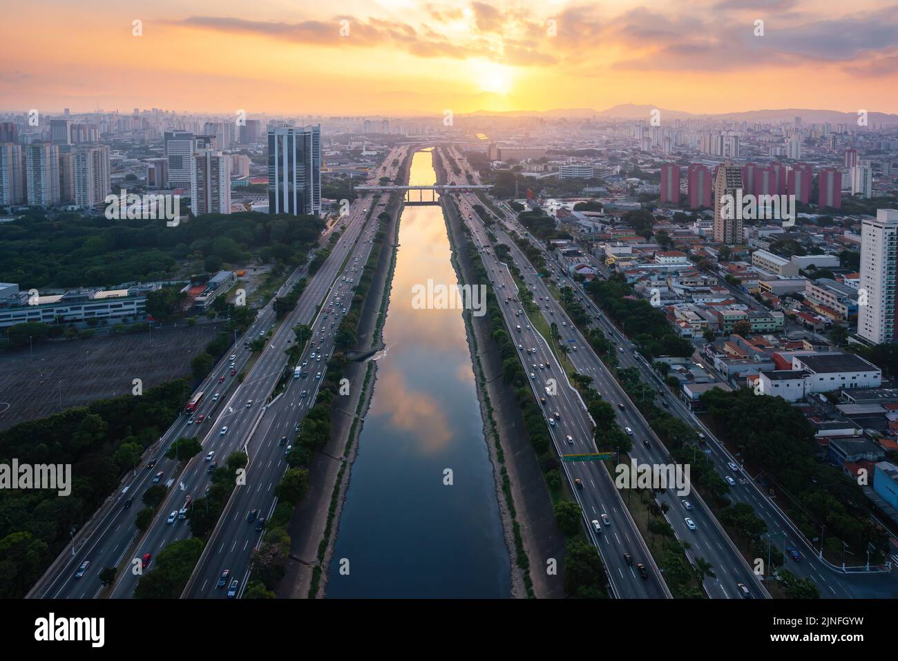 Tiete River, Marginal Tiete Highway and Limao Bridge aerial view at sunset - Sao Paulo, Brazil Stock Photo