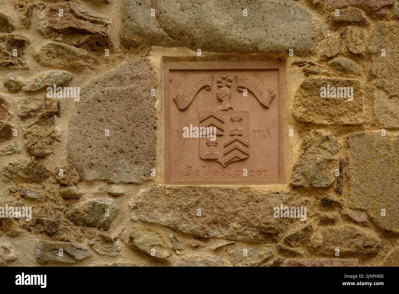 Detail of a portal in the town square of Osor, in Les Guilleries mountains (La Selva, Gerona, Catalonia, Spain)  ESP: Detalle de un portal en Osor Stock Photo